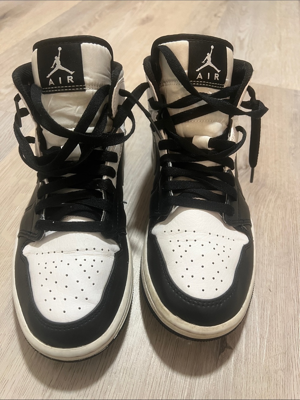 Air Jordan’s Black and White High-Top Sneakers